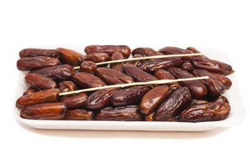 fresh dates fruits isolated on white
