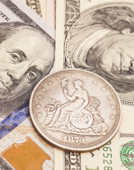 US dollar bills and coin