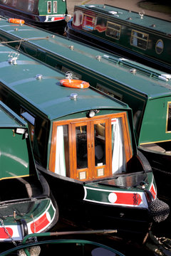 Canal barges.
British canal barges tethered together.