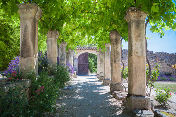 Fototapety  The old abbey of St.Hilaire near the village Lacoste in Provence  