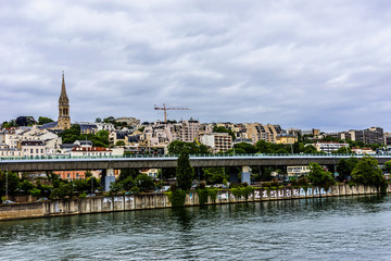Embankments of Seine River. District Saint-Cloud, Paris, France.