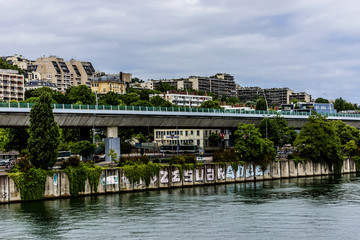 Embankments of Seine River. District Saint-Cloud, Paris, France.