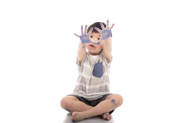 Happy little asian boy with dirty hand