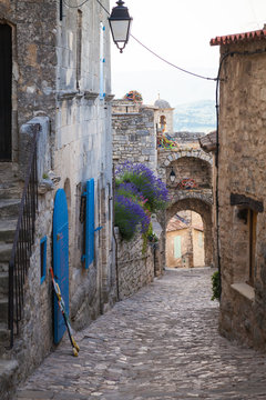 Fototapeta In the streets of Lacoste, a small village in Provence