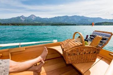 Fotobehang Picknick op de boot bij het meer © MichaelStabentheiner