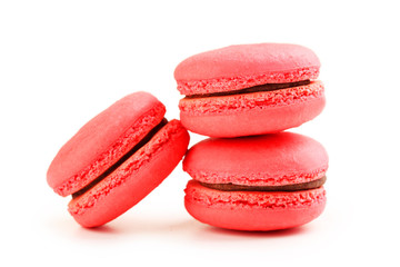 Tasty red macarons isolated on white