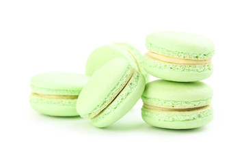 Tasty green macarons isolated on white