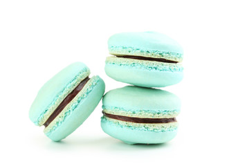 Tasty blue macarons isolated on white