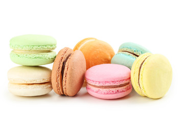 French colorful macarons isolated on white