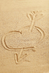 Heart handwritten on a beach sand