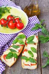 Pizza margherita on french baguette. Rustic style
