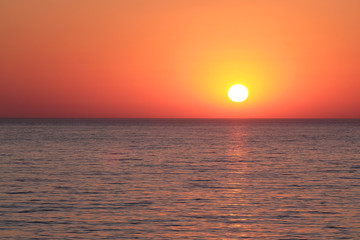 Fototapeta na wymiar Landscape with the image of a sea sunset