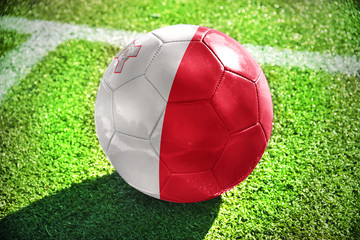 football ball with the national flag of Malta on the field