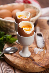 Boiled eggs on a wooden background