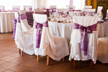 wedding chairs with ribbon, event place
