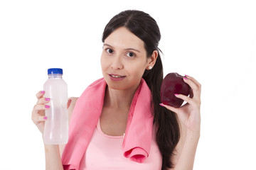 girl playing sports with apple and water bottle