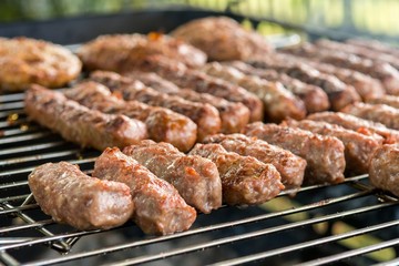 Tasty meat on a barbeque. 