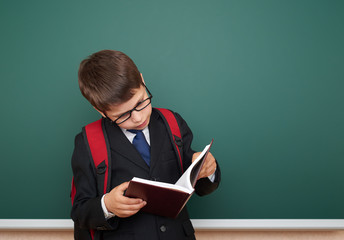 school boy portrait near board