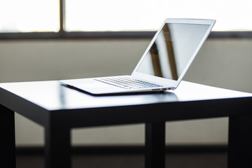 Stylish and classy, the laptop in the workplace.
