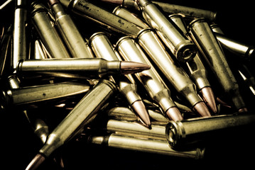 Pile of 5.56 (223) Rifle Ammunition - obrazy, fototapety, plakaty