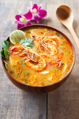 Tom Yam Kung ,thai food in wooden bowl 