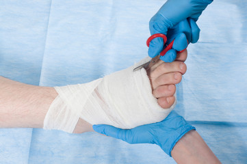 doctor cut bandage