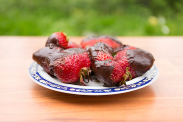 red strawberries in chocolate