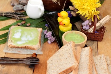 Bread with green custard and fresh milk.