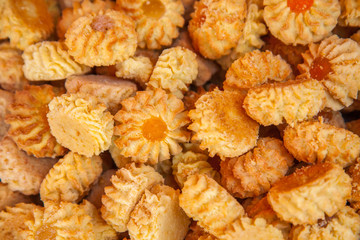 Kurabie cookies with apricot fruit jelly as a background for design