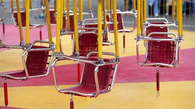 Carousel swings in amusement park