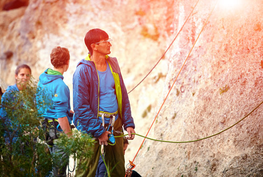 belayer with the rope and carabines
