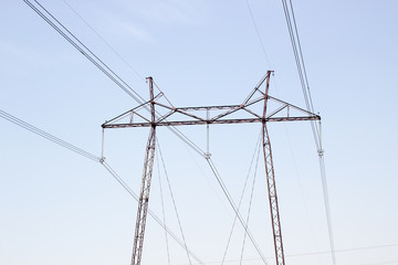 Fototapeta premium Electric pole in the autumn field