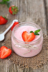 Strawberry yogurt and ripe strawberry