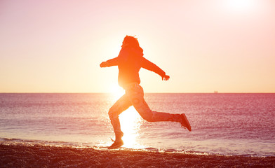 girl running on the beach