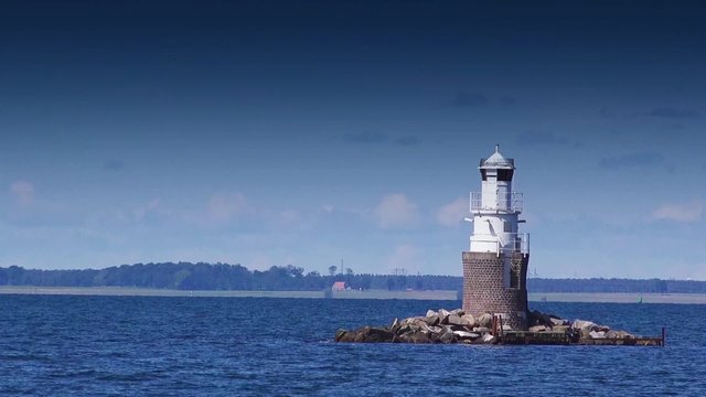 Lighthouse at Open Sea, Sunny Summer Day