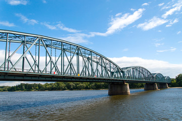Fototapeta na wymiar Steel bridge in Torun over the Vistula river, Poland
