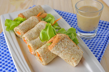 sandwich tuna roll with Mayonnaise and sesame sauce on plate