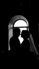 silhouette of  bride and groom 