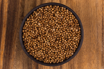 Close up of dried coriander seeds in a bowl