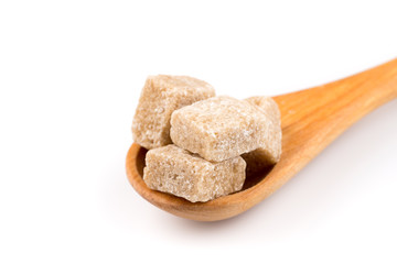 brown sugar in a wooden spoon