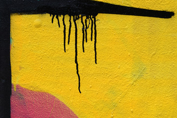 black lines yellow wall