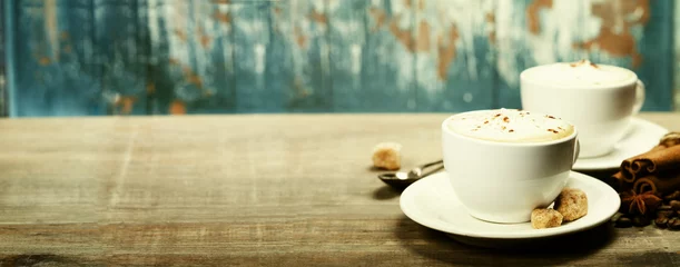 Fotobehang Twee kopjes koffie op tafel © Natalia Klenova