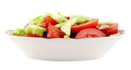 sliced cucumbers and tomatoes in a bowl