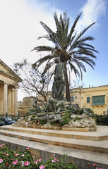 Fototapeta na wymiar Monument to Dun Mikiel Xerri on Independence square in Valletta. Malta