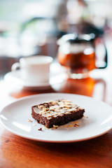 close up of an almond brownie on plate 
