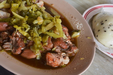pork stewed in the gravy and Chinese bun