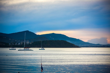 Beautiful sea landscape, sailboat sailing on the distance On