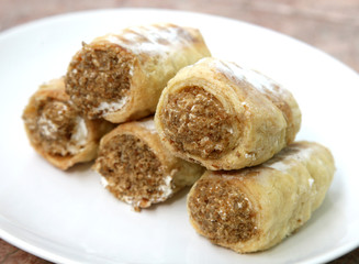 Homemade tube with cream and nuts