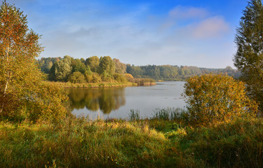 Foggy autumn lake