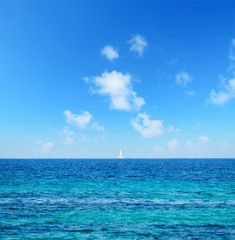 Fototapeta premium boat at the horizon with fata morgana effect